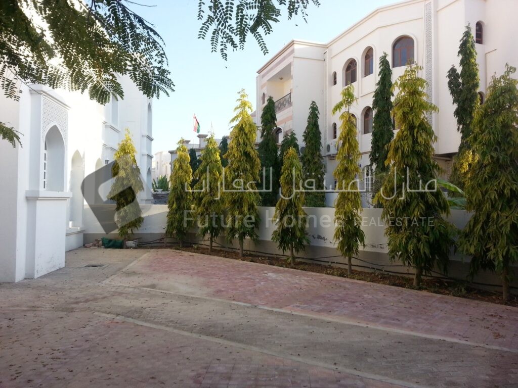 Private garden area of twin villa in Azaiba